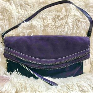New with tags WORTHINGTON LEATHER PURPLE PURSE with MATCHING CLUTCH ( detaches)